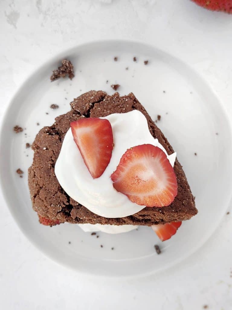 Unexpectedly amazing high-protein easy Chocolate Strawberry Shortcakes! Made with chocolate protein scones and a protein powder yogurt mix, these chocolate strawberry shortcakes are healthy, sugar free, low fat and tasty!