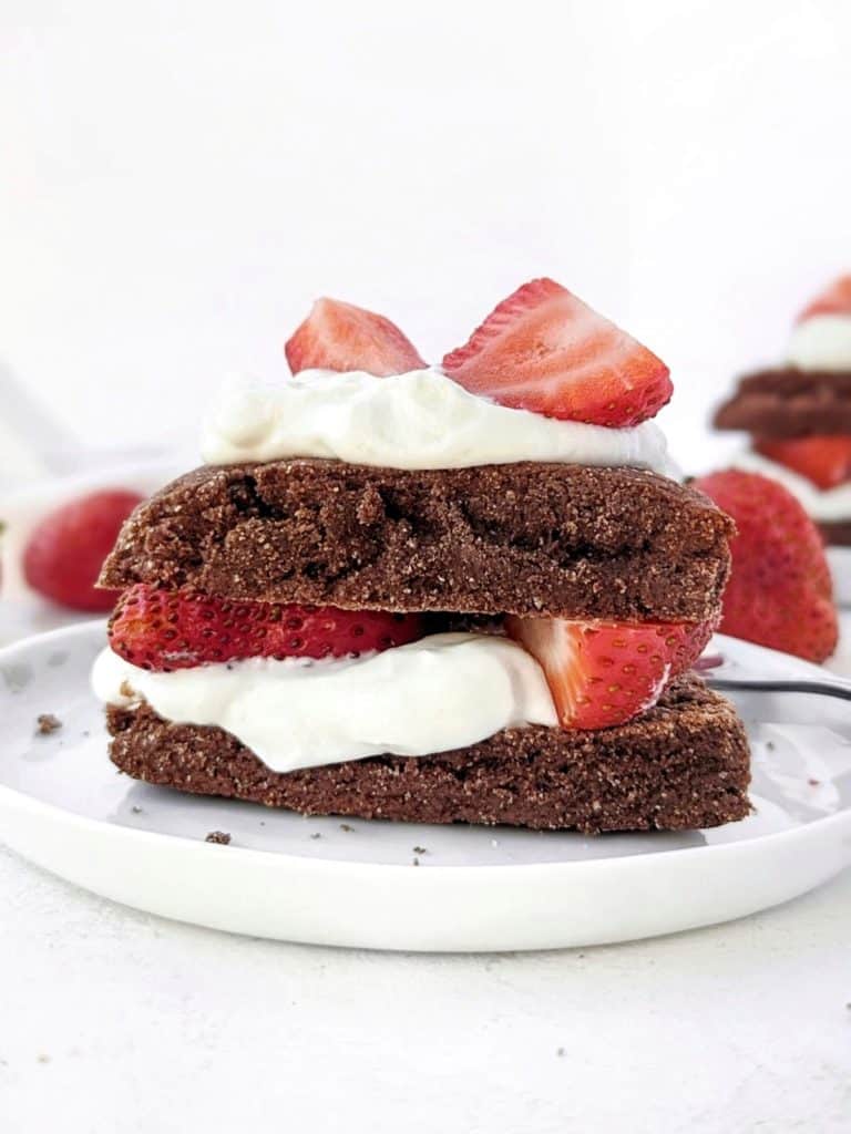 Unexpectedly amazing high-protein easy Chocolate Strawberry Shortcakes! Made with chocolate protein scones and a protein powder yogurt mix, these chocolate strawberry shortcakes are healthy, sugar free, low fat and tasty!