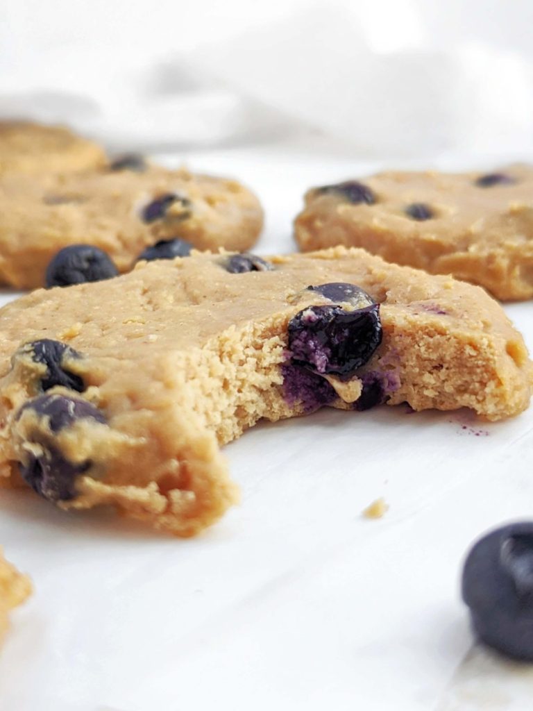 Just amazing Peanut Butter Blueberry Protein Cookies made with oat flour, peanut butter powder and no eggs for a gluten free, low fat and Vegan recipe! These high protein blueberry oatmeal cookies are a great healthy breakfast or post-workout treat.