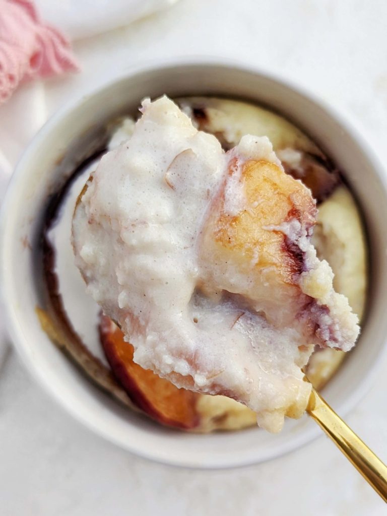 The perfect high Protein Peach Mug Cake with a ton of protein powder and egg whites, and no sugar or butter. Healthy peach mug cake is gluten free, low carb, and easily vegan too!