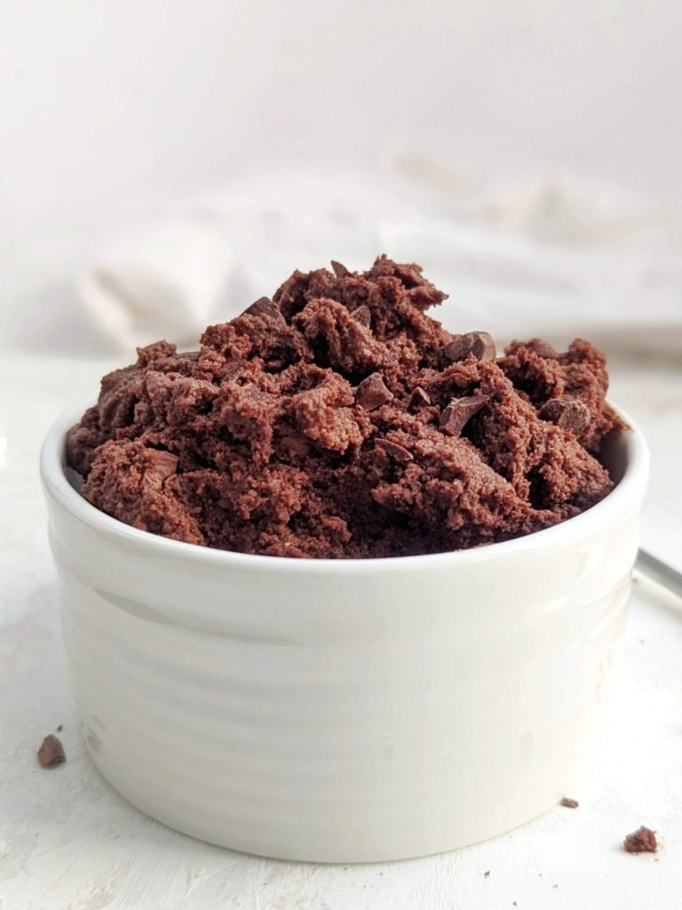 Quick and easy no bake Edible Protein Brownie Batter for one made in under 2 minutes! This single serve chocolate protein brownie batter uses protein powder for a sweetener, is gluten free, Vegan and an overall healthy snack, dessert or post workout treat.