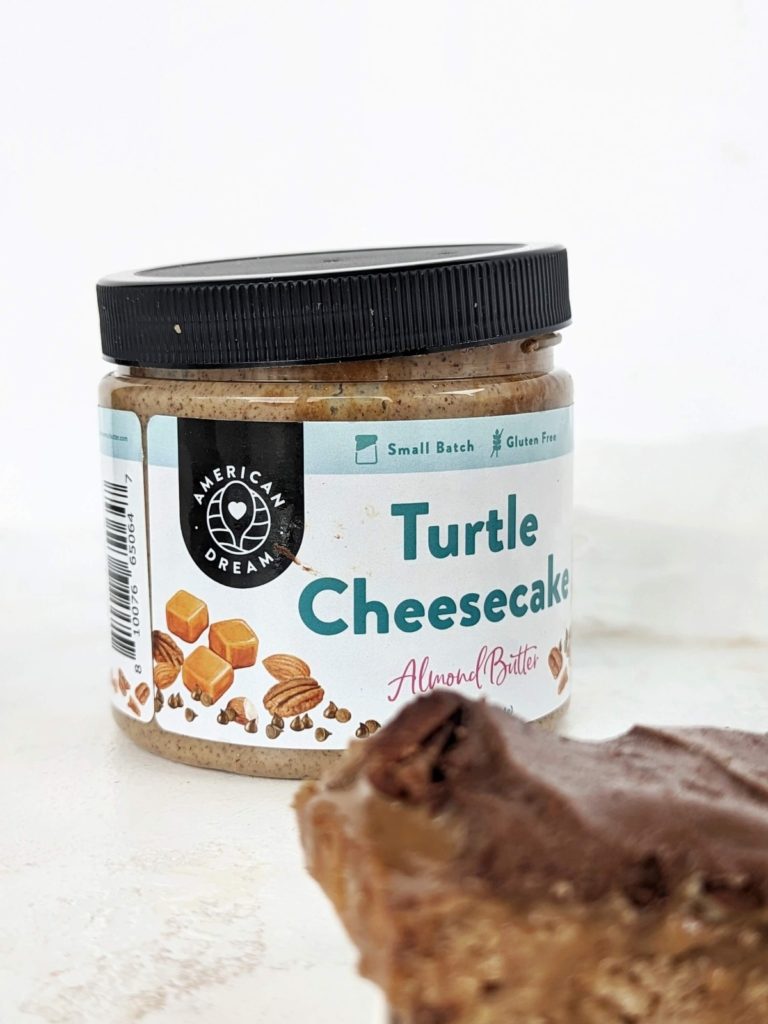 Ooey-gooey Turtle Protein Bars with layers of a caramel-y base, caramel, pecans and chocolate frosting, but all high protein and low sugar! Healthy chocolate caramel pecan turtle bars to satisfy those cravings.