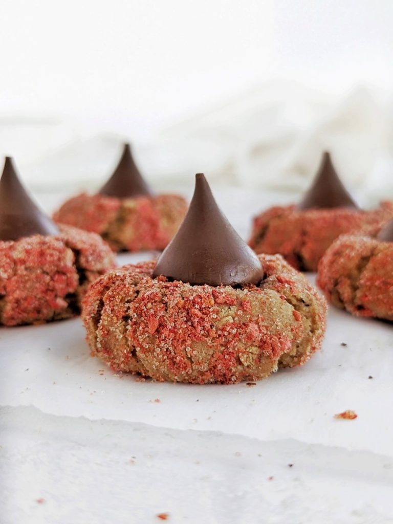 Extra love for Valentine’s Day Protein Cookies - healthy, low fat PB blossom cookie with V-day themed peanut butter, monkfruit and freeze dried strawberry coating, Hershey’s Kiss on top! 