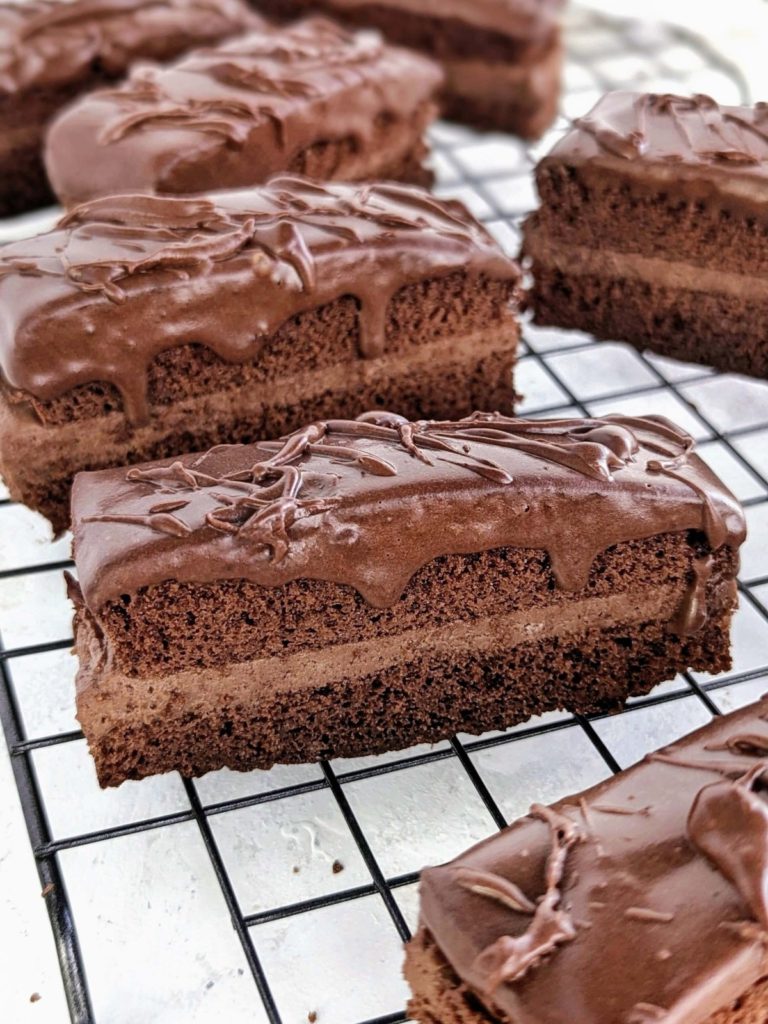 Healthy Frosted Fudge Cakes recipe is the best Little Debby copycat you can get; High protein chocolate cake sandwiched with protein chocolate frosting and topped with high protein chocolate fudge ganache. A low fat, sugar-free recipe.