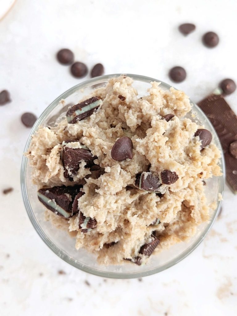 Indulgent and refreshing Mint Chocolate Chip Protein Cookie Dough - a healthy minty cookie dough made with protein powder and mint cashew butter loaded with sugar-free chocolate chips and mint chocolate candies!