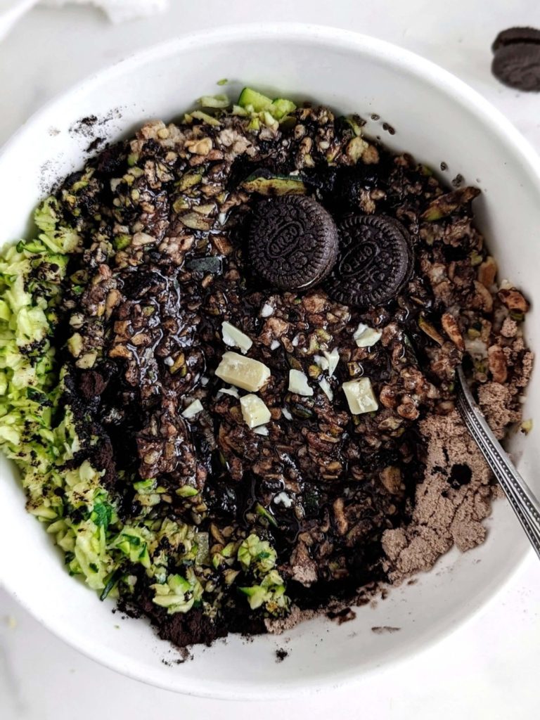 Oreo Protein Zucchini Oats is the best ever breakfast you will have! Creamy high protein oatmeal with shredded zucchini is a low calorie, high volume meal that actually tastes like a bowl of Oreo!