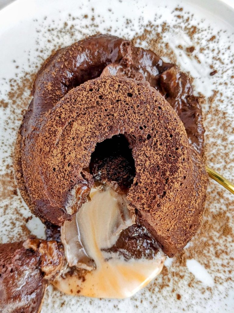 Healthy Creme Egg Protein Lava Cake made in the microwave in under 2 minutes! Quick Easter dessert with protein powder and Greek yogurt instead of sugar and butter for an indulgent but low-guilt treat.