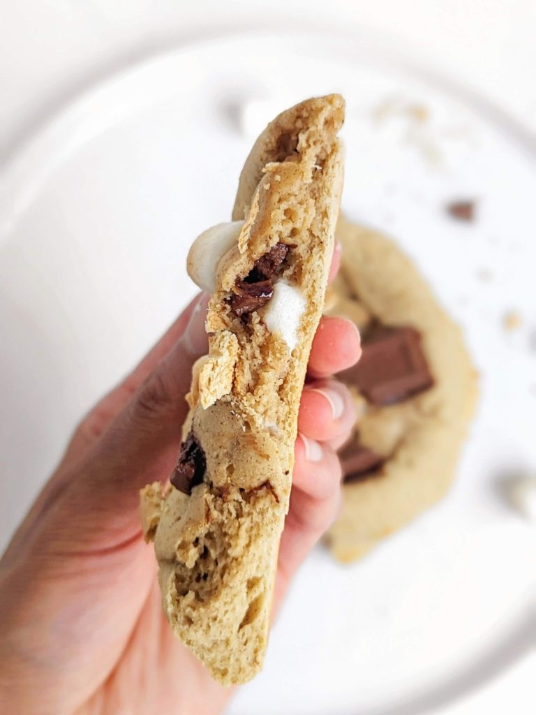 A giant single S’mores Protein Cookie recipe made with oat flour, sweetened with protein powder and topped with chocolate and marshmallow! Single serving baked protein cookie is a healthy dessert for one and will leave you wanting s’more.