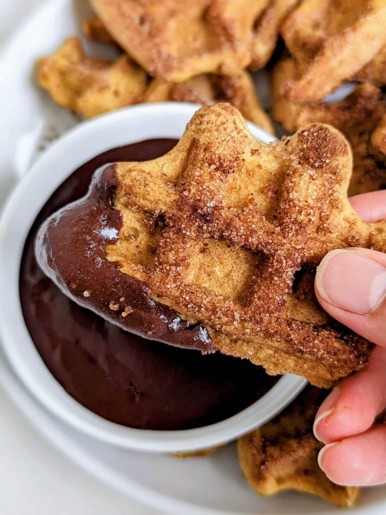 Churro Protein Waffles with a Protein Chocolate Sauce - breakfast that feels like a treat, but fuels your day! A healthy, sugar free recipe.