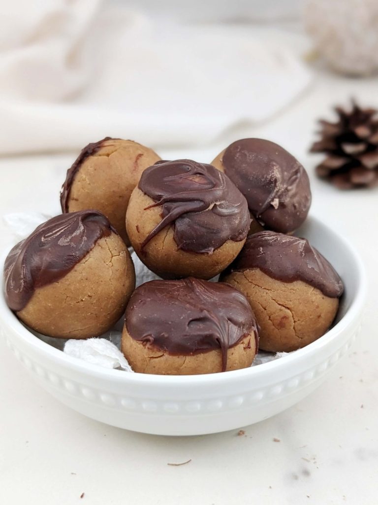 Double Peanut Butter Protein Truffles made with the nut butter and powdered peanut butter. Dip them in some melted chocolate and make high protein buckeye balls! A pretty perfect snack, dessert, or post workout treat!