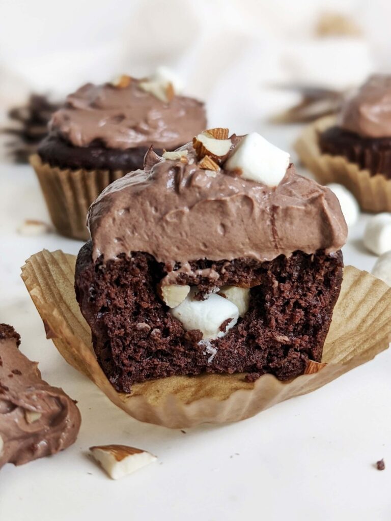 Surprise Rocky Road Protein Cupcakes with a marshmallow almond filling! Healthy, low fat and low sugar rocky road cupcakes are perfect for a party.