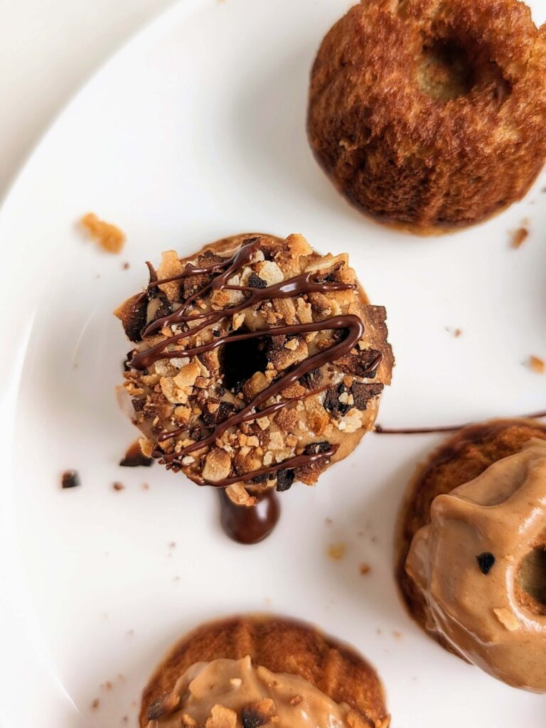 Soft, fluffy and Healthy Samoa Cake made with protein powder and no sugar! Mini Samoa Cookie Bundt Cakes have coconut caramel flavor, but high protein, low fat, low carb and low calorie.