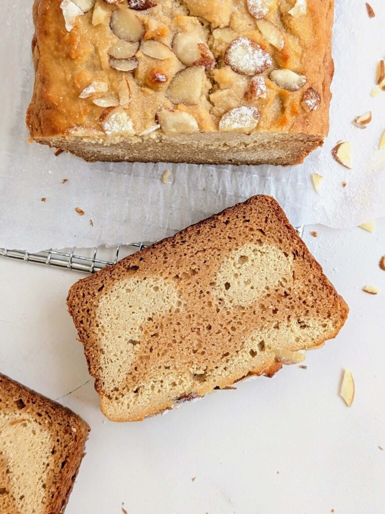 Almond Croissant Loaf is a high protein breakfast dream come true! Healthy almond croissant bread is a high protein loaf cake with heathy almond frangipane and no sugar!