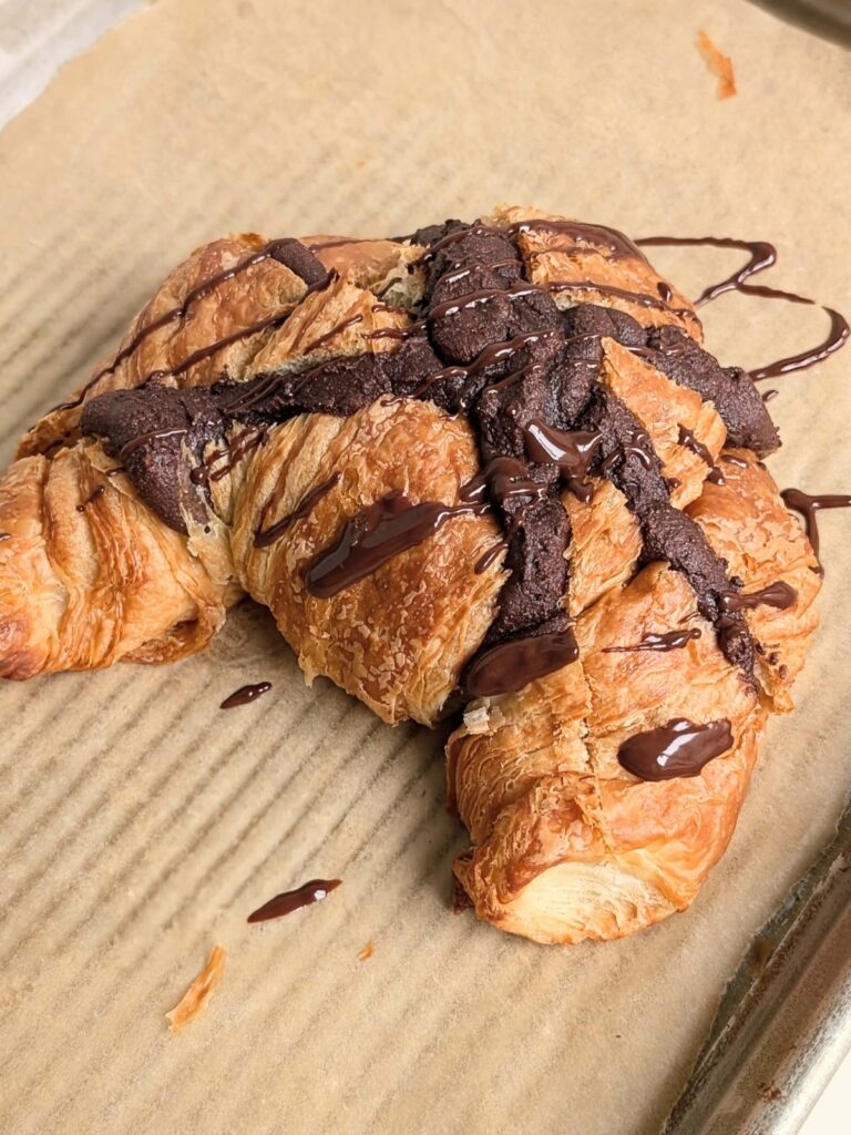 A truly amazing Brownie Croissant recipe that’s high protein and sugar free! Healthy brownie croissant is a flaky croissant filled with a high protein brownie batter - breakfast goals!