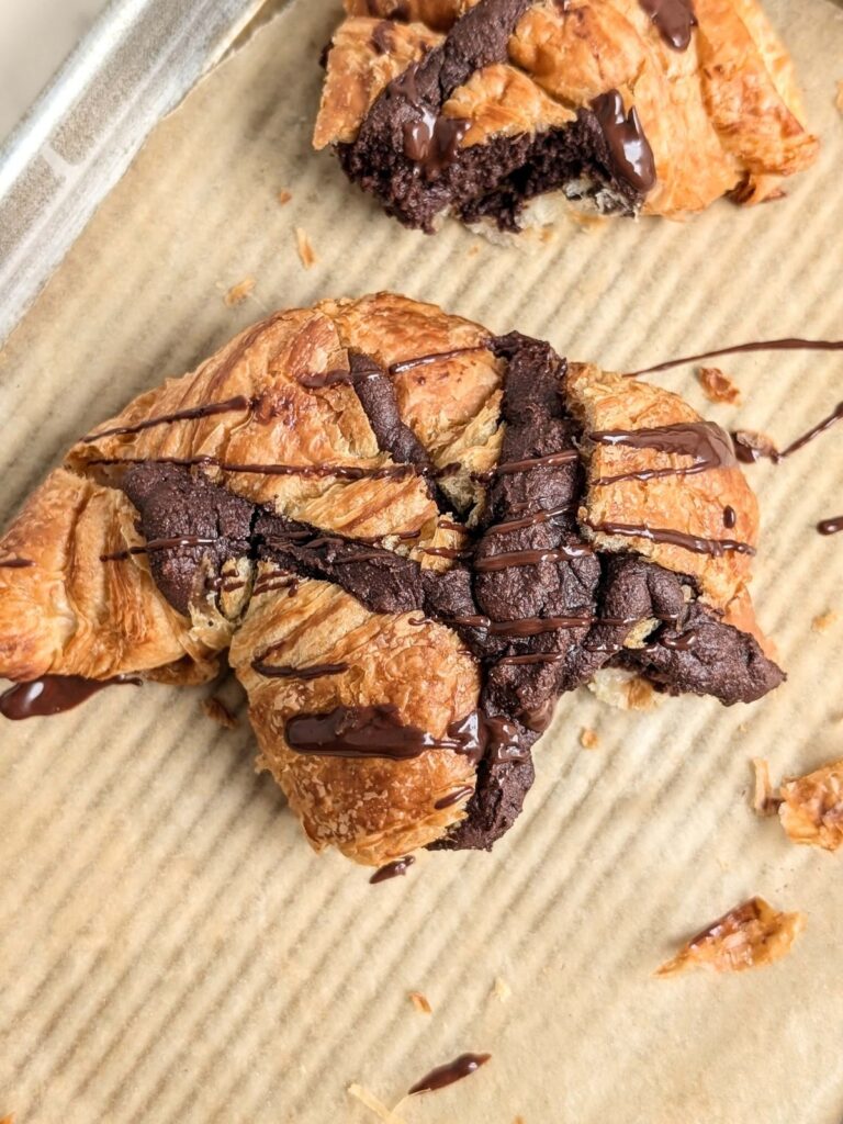 A truly amazing Brownie Croissant recipe that’s high protein and sugar free! Healthy brownie croissant is a flaky croissant filled with a high protein brownie batter - breakfast goals!