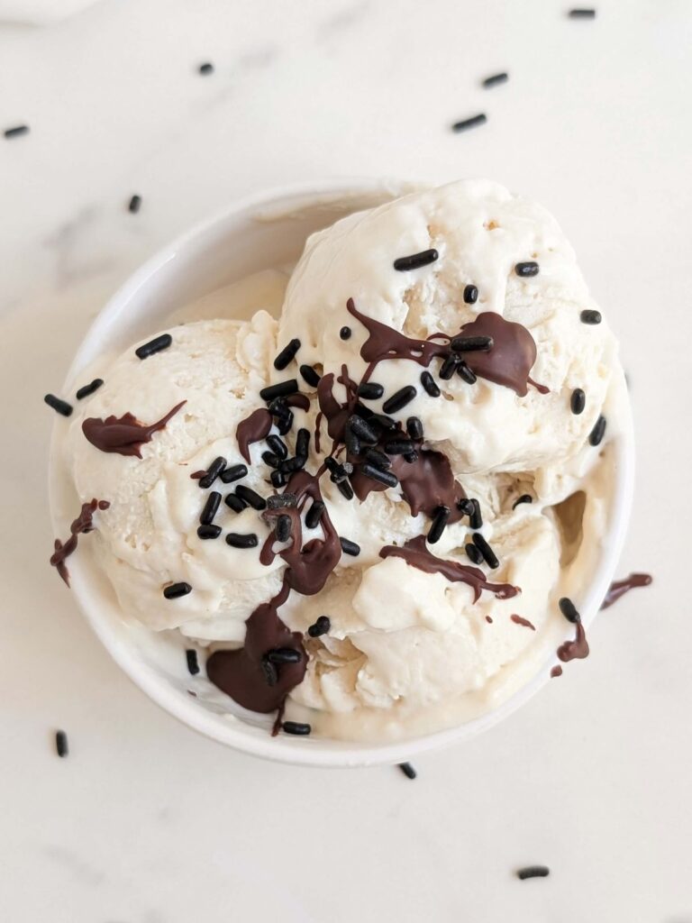 Amazing healthy protein ice cream recipe with no banana, no ice cream maker and no Ninja Creami! This vanilla protein ice cream recipe is easy, low sugar, low fat and low calorie too.