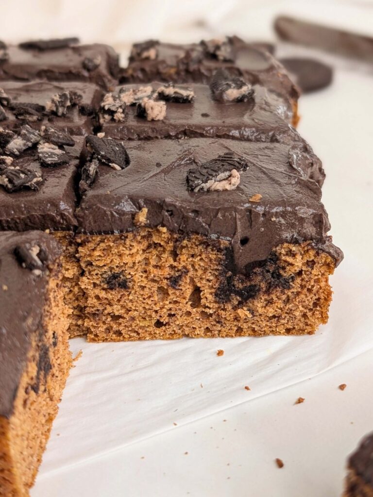 Oreo Pumpkin Bars are the ultimate healthy fall dessert - a moist pumpkin cake with a creamy Oreo filling and a rich Oreo frosting. With high-protein ingredients, no added sugar, and low fat, this dessert is perfect for satisfying your sweet tooth without derailing your health goals.