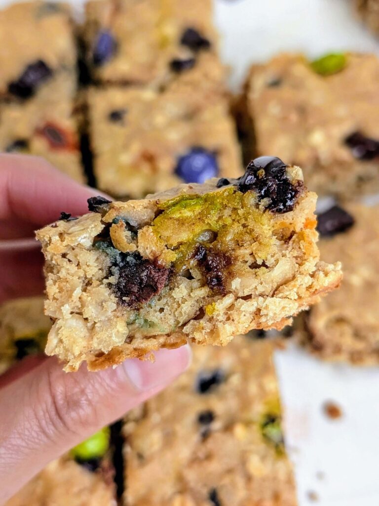 One-bowl Healthy Monster Cookie Bars packed with protein! These monster cookie baked oats are lower sugar and lower fat and perfect for a breakfast or post-workout snack.