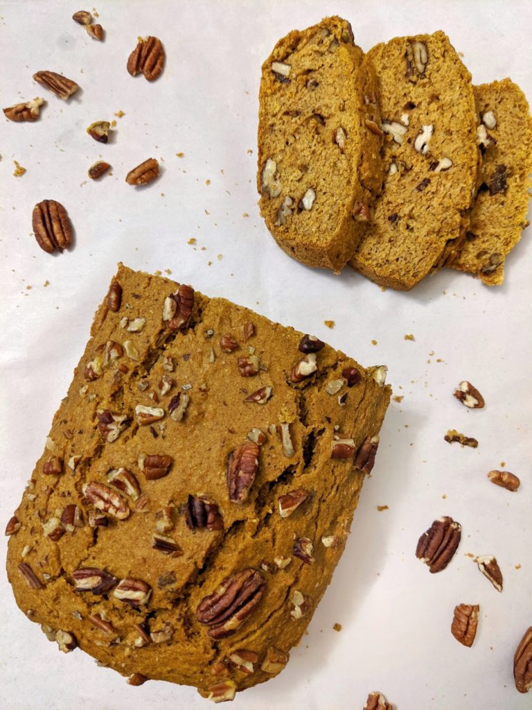 Celebrate the fall flavors with this Deliciously Healthy Pumpkin Pecan Loaf. It's made with nutritious ingredients and turns out perfectly moist and marvelous! With the crunch from the pecans, this one-bowl wonder will be your new favorite whole wheat pumpkin bread!