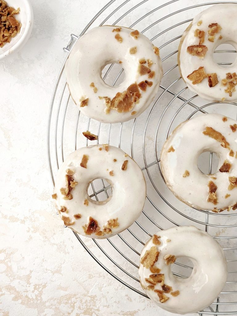 These healthy and skinny maple glazed donuts are made with clean, simple, but high protein ingredients like protein powder and Greek yogurt for an extra protein doughnut recipe!