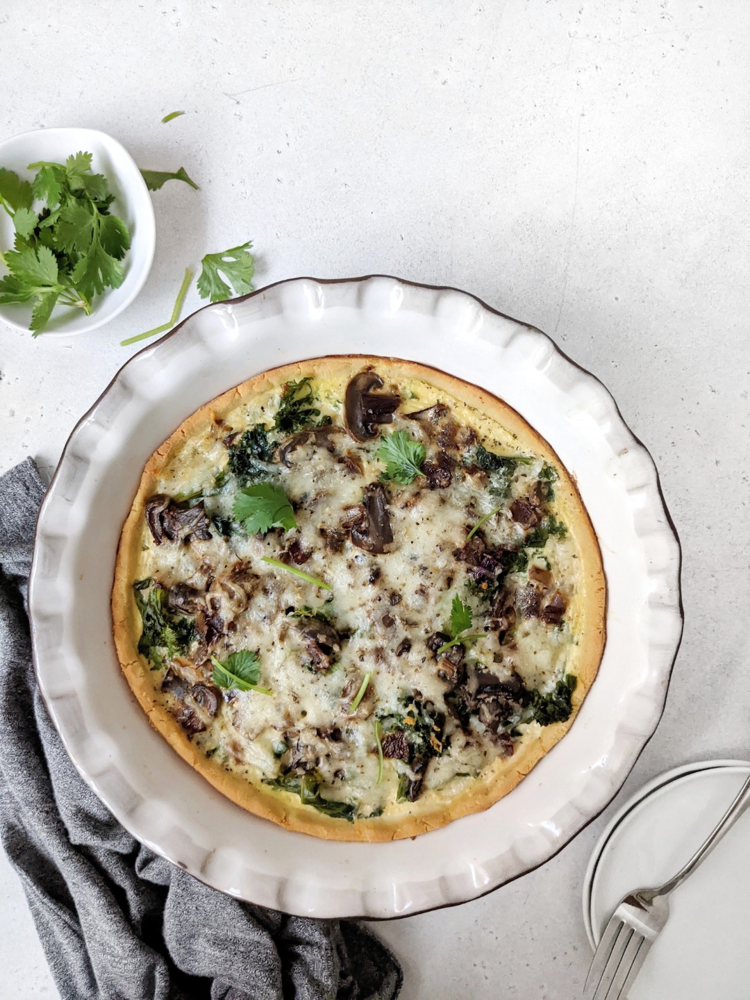 https://www.haylskitchen.com/wp-content/uploads/2020/10/Mushroom-Kale-Quiche-with-Coconut-Flour-Crust-1.jpg