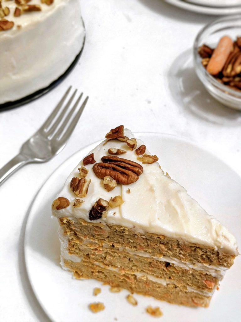 Without a doubt the Best Darn Healthy Protein Carrot Cake you will ever eat: Made with whole ingredients and protein powder, and topped with a protein yogurt frosting. This will be surely your new favorite carrot cake recipe!