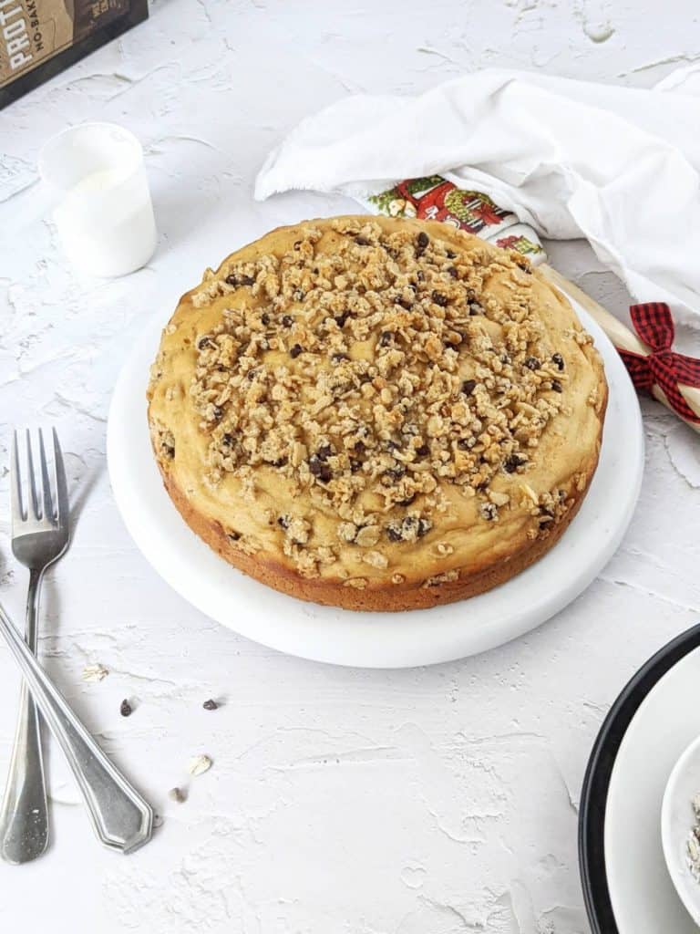 A super easy and simple Vanilla Protein Cake topped with an Oat Streusel - the perfect high protein cake recipe for a birthday or just a dessert. Made with whole wheat flour and vanilla protein powder, this protein cake is healthy and sugar-free too!