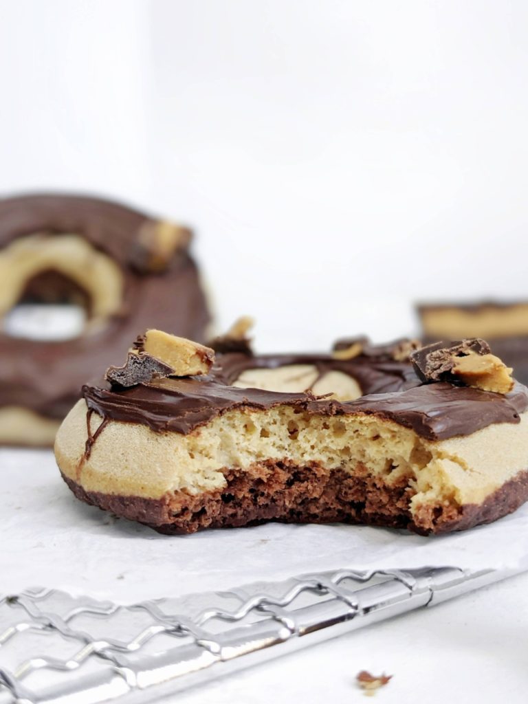 Spot-on Peanut Butter Cup Protein Donuts with chocolate and peanut butter protein donut layers glazed with chocolate. These Reese’s protein donuts are low fat, low calorie and sugar free too!