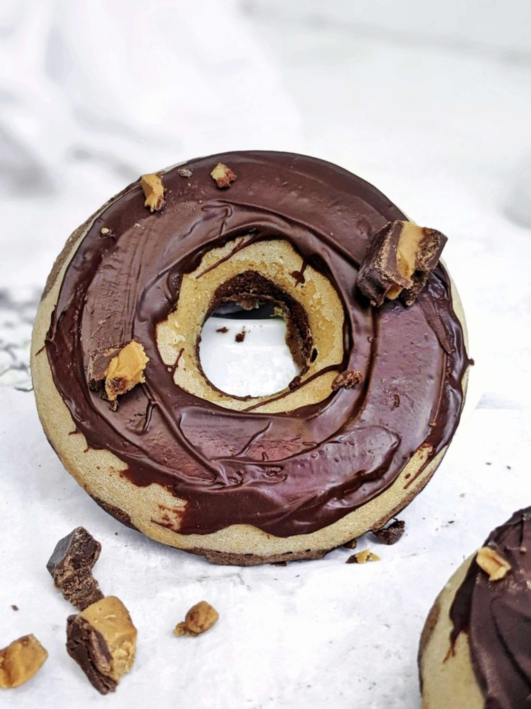 Spot-on Peanut Butter Cup Protein Donuts with chocolate and peanut butter protein donut layers glazed with chocolate. These Reese’s protein donuts are low fat, low calorie and sugar free too!