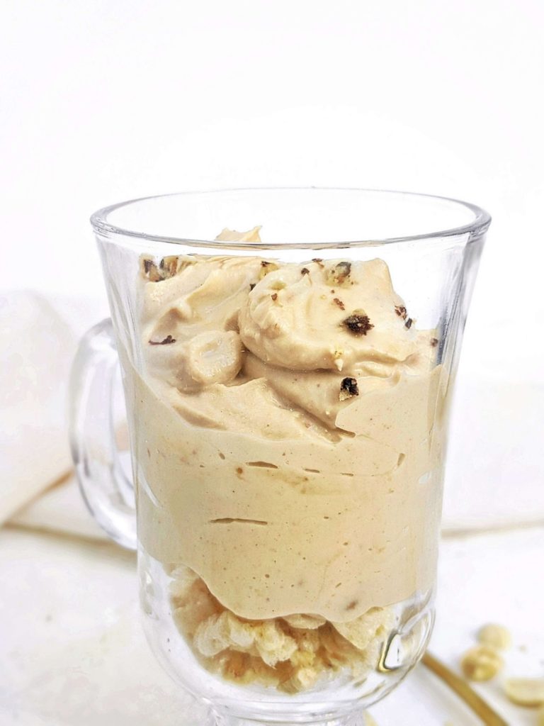 A quick, easy and creamy Peanut Butter Protein Mousse with protein powder, Greek yogurt and powdered peanut butter. Healthy powdered peanut butter mousse has no heavy cream or cream cheese, and is low calorie, low carb, keto and easily Vegan too!