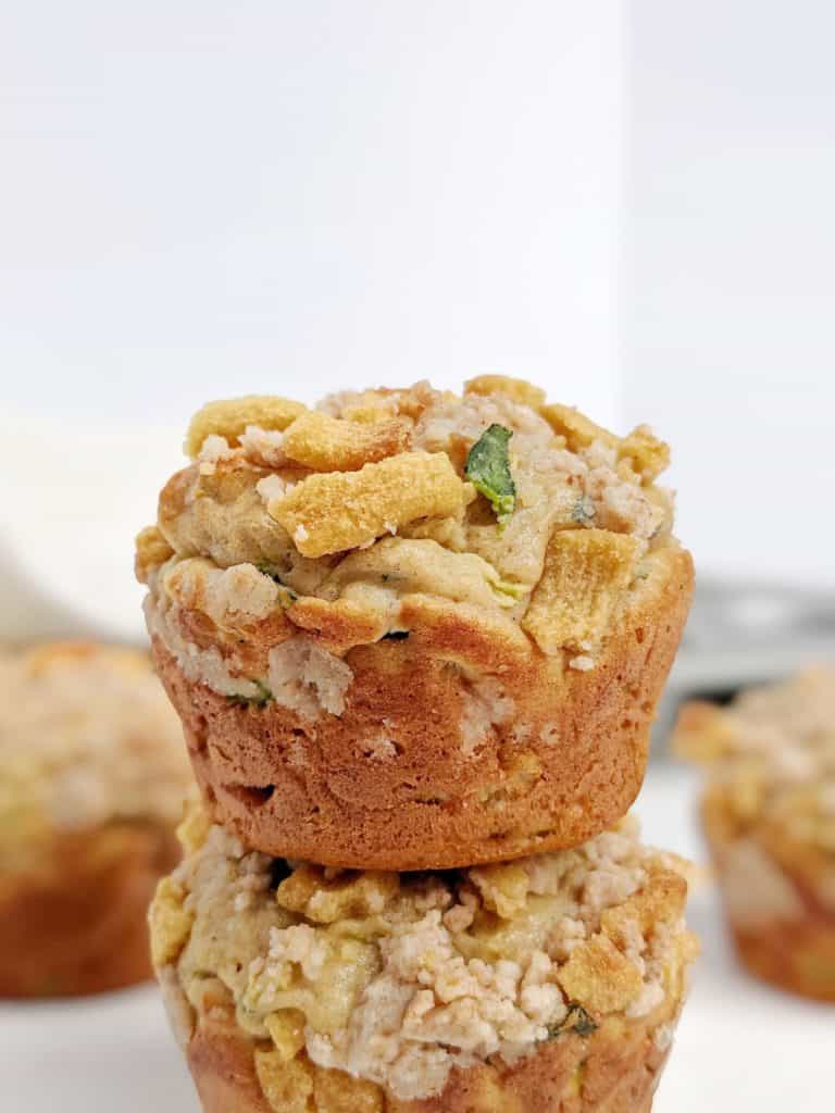 Just amazingly good Protein Zucchini Muffins topped with Cinnamon Crunch Streusel! These high protein cinnamon zucchini muffins use protein powder and Greek yogurt, have only a little oil and make a great healthy and low calorie zucchini recipe.