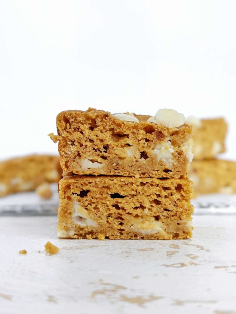 White Chocolate Pumpkin Protein Blondies loaded with pumpkin spice - a fall-perfect pumpkin dessert! These healthy pumpkin protein powder blondies are gluten free, Vegan and low calorie too!