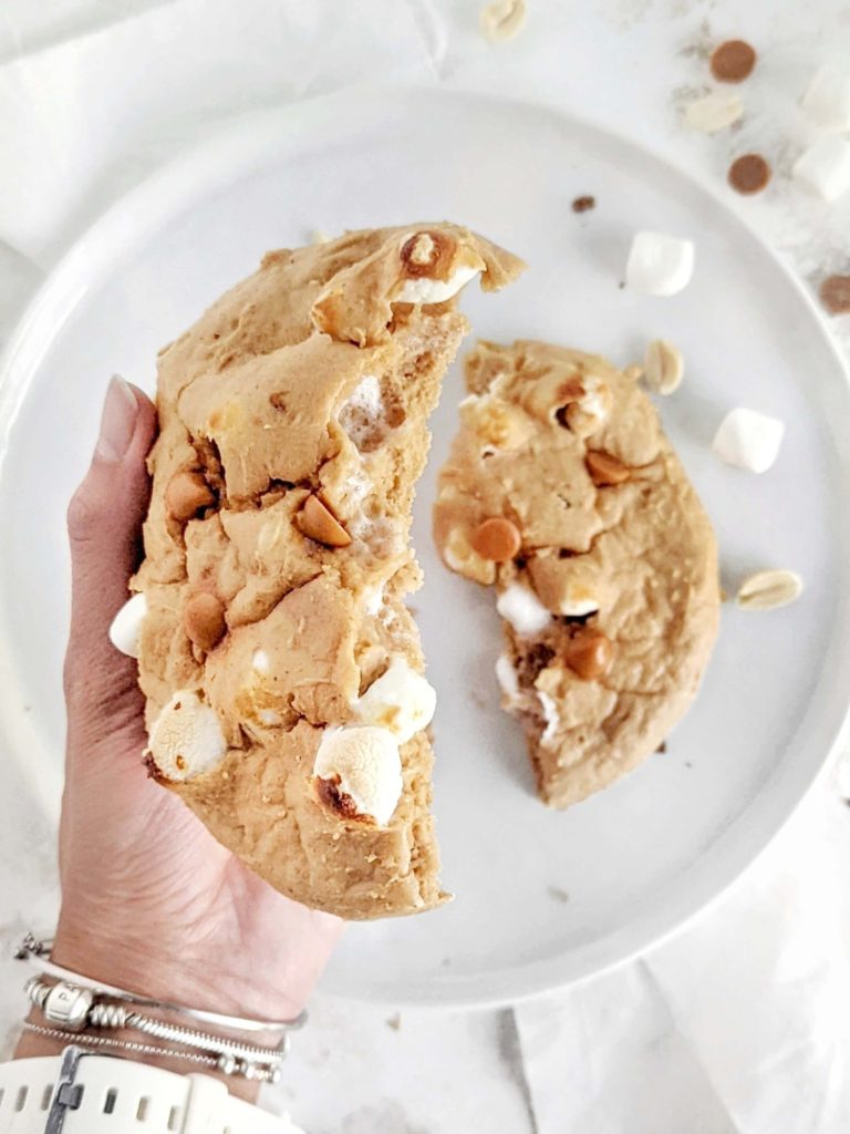 An amazing Fluffernutter Protein Cookie for one made with marshmallow and peanut butter powder for a healthy recipe. This peanut butter marshmallow protein cookie is gluten free, has no butter and vegan option too.