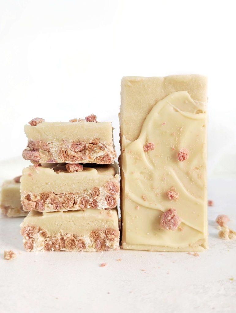 Pretty and tasty Milk and Cereal Protein Bars for a low calorie, low fat, high protein breakfast, snack or post-workout treat. This healthy milk n cereal bars recipe uses protein powder and low sugar cereal and a ton of greek yogurt for those layers!