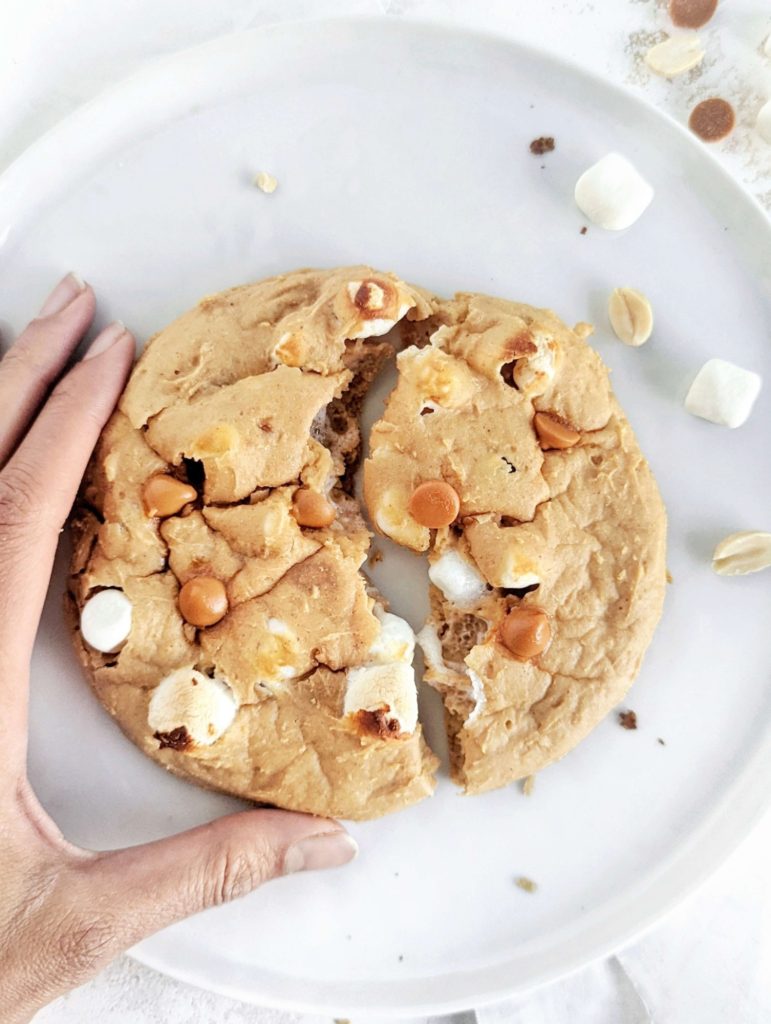 An amazing Fluffernutter Protein Cookie for one made with marshmallow and peanut butter powder for a healthy recipe. This peanut butter marshmallow protein cookie is gluten free, has no butter and vegan option too.