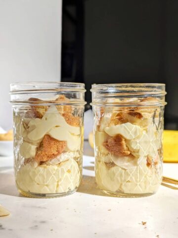 Healthy Protein Banana Pudding with layers of protein powder custard, sugar free vanilla waters and fresh banana. This banana cream pudding is an easy, healthy, no bake recipe without condensed milk or any added sugar.