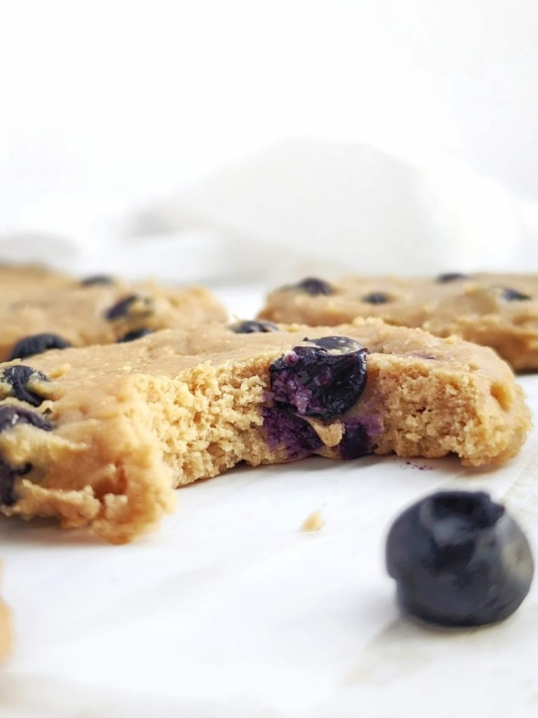 Just amazing Peanut Butter Blueberry Protein Cookies made with oat flour, peanut butter powder and no eggs for a gluten free, low fat and Vegan recipe! These high protein blueberry oatmeal cookies are a great healthy breakfast or post-workout treat.