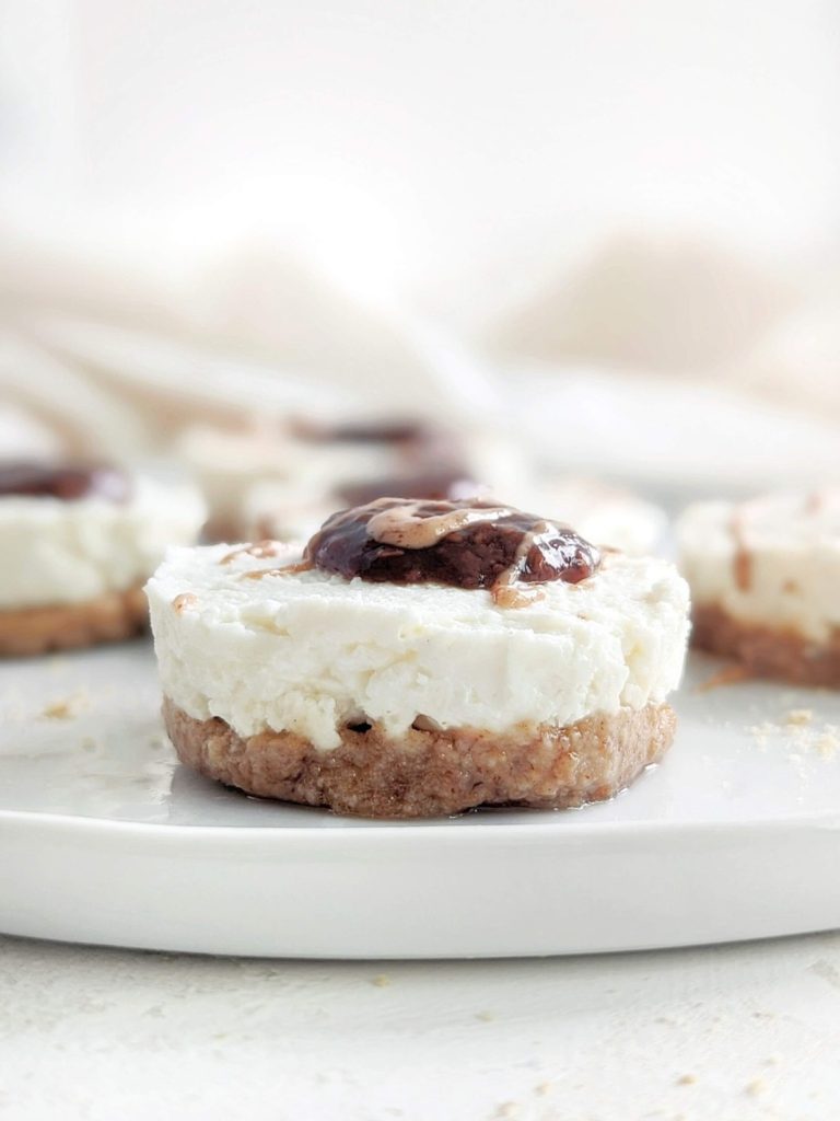 This No Bake Mini Protein Cheesecake with Greek yogurt and reduced fat cream cheese for an easy and healthy cheesecake recipe. No bake protein powder cheesecake bites are great for a portion control dessert or entertaining guests too.