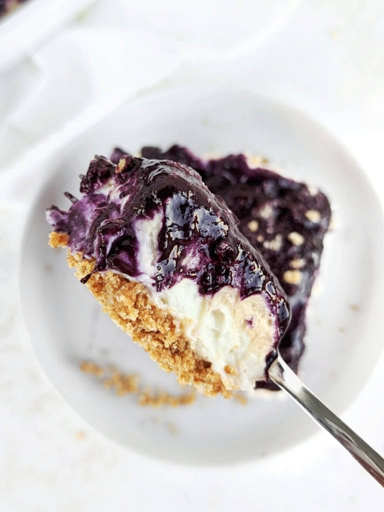 A real easy no-bake Blueberry Lasagna recipe with a graham cracker crust, protein vanilla and peanut butter pudding and homemade berry jam. Healthy blueberry delight sure to please a crowd!