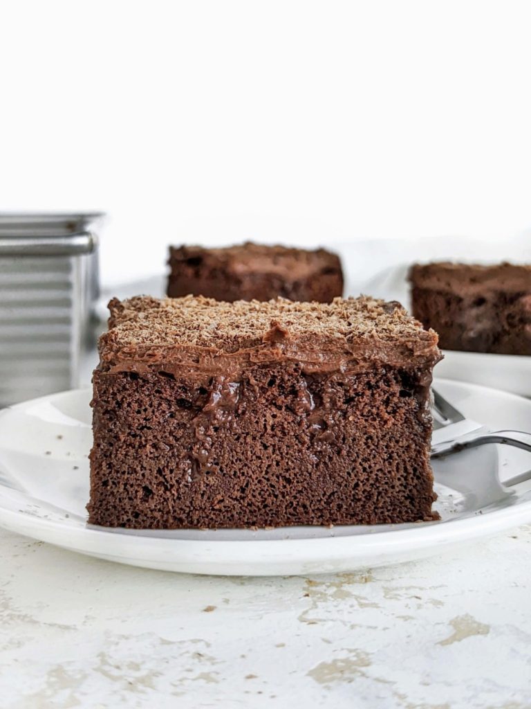 The ultimate Chocolate Protein Poke Cake with a high protein cake, filing and frosting! Healthy chocolate poke cake is low sugar, low fat and a triple threat with the protein powder in there.