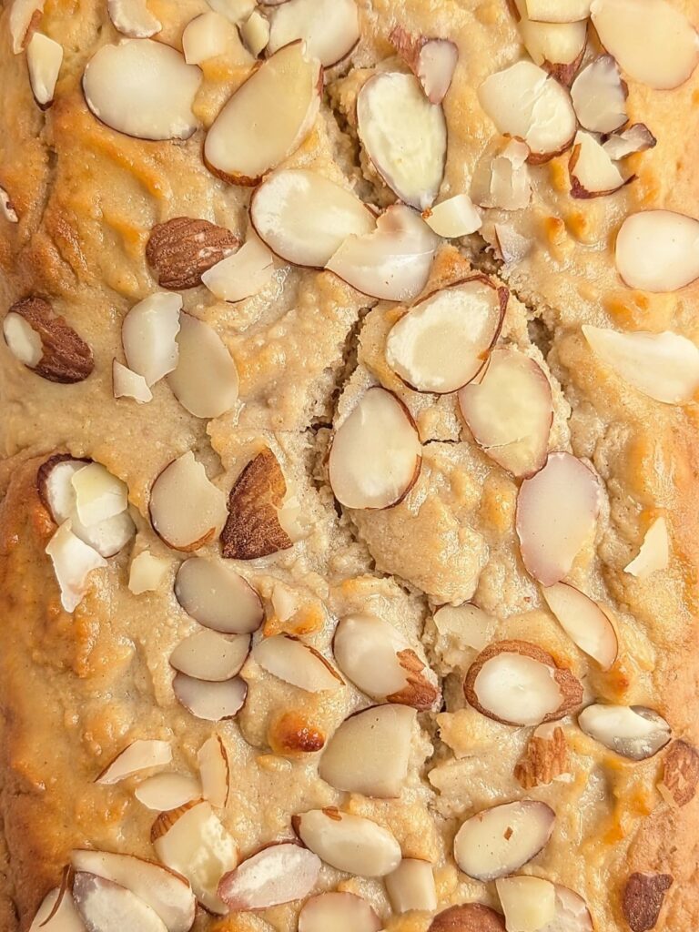 Almond Croissant Loaf is a high protein breakfast dream come true! Healthy almond croissant bread is a high protein loaf cake with heathy almond frangipane and no sugar!