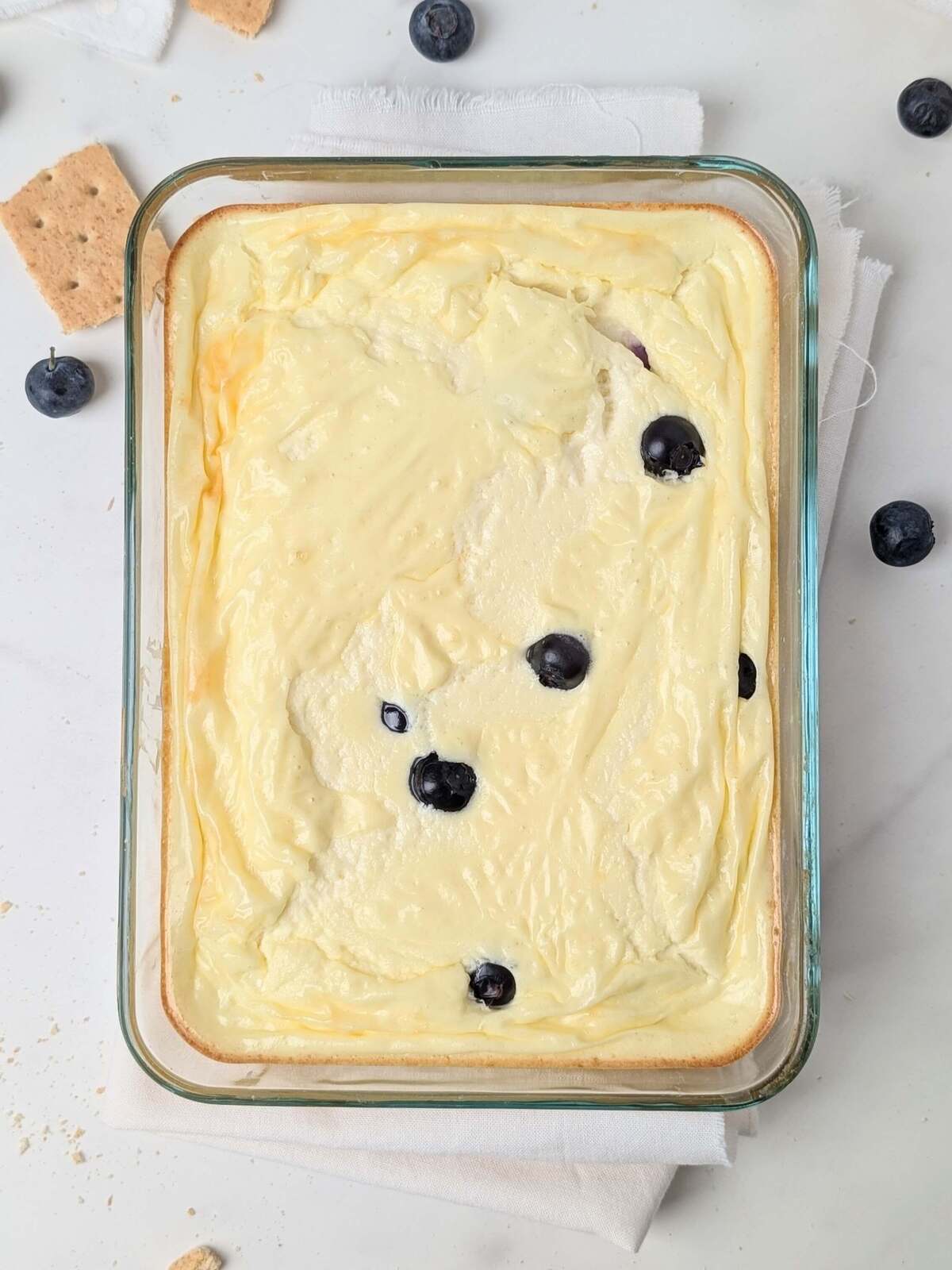 High Protein Blueberry Cottage Cheese Bake is a 5-ingredient, healthy, sugar-free dessert or breakfast! An easy recipe with protein from cottage cheese and protein powder; Perfect for meal prep too.