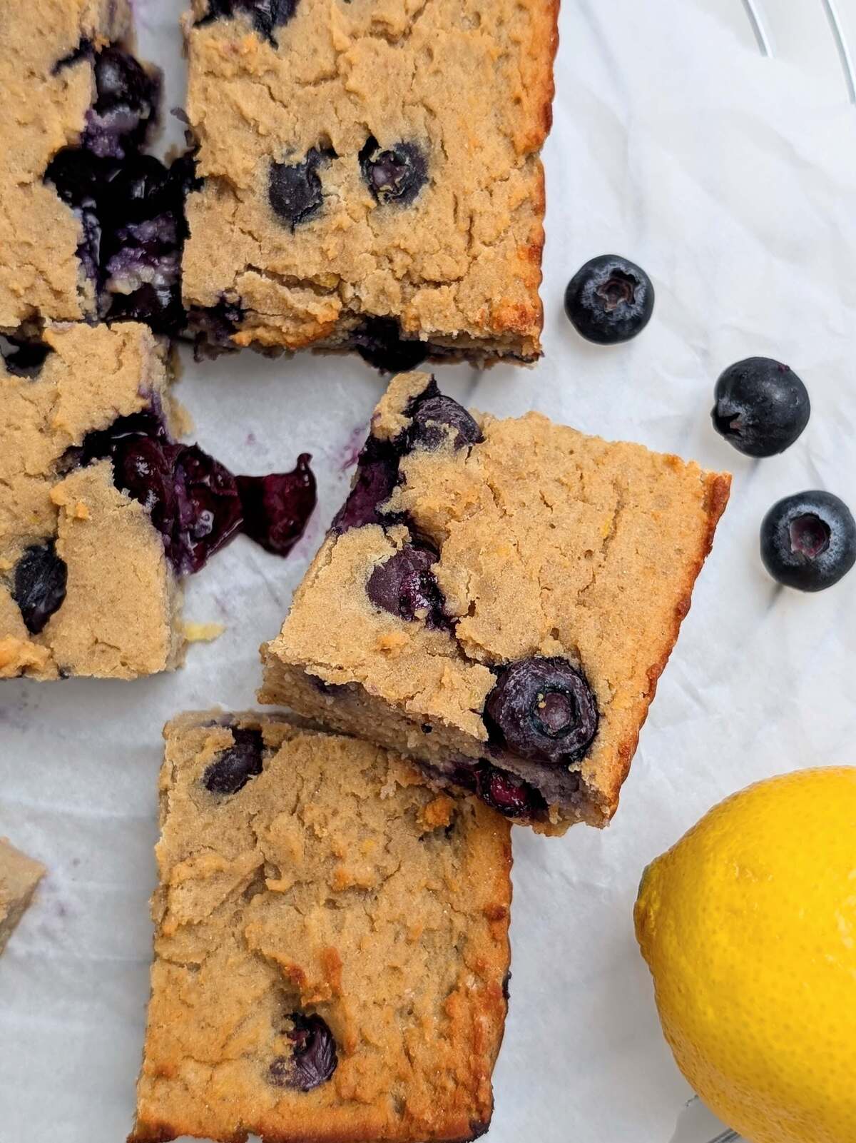 Perfect Lemon Blueberry Protein Bars packed with fresh blueberries, zesty lemon flavor, and still low carb, low fat, low sugar and gluten free! It’s even got a plant-based lemon lemon blueberry protein powder!